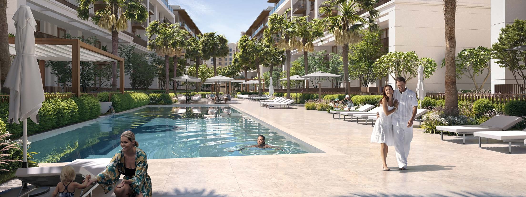 SHIMMERING POOL SURROUNDED BY LUSH LANDSCAPE amenity image