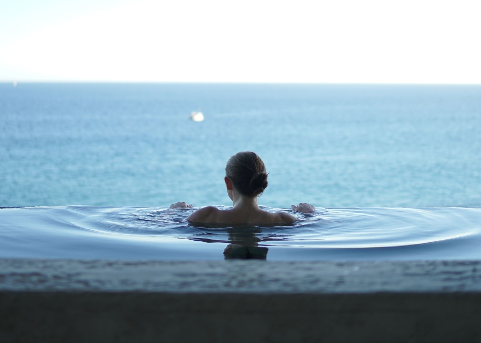 Climate-controlled infinity pools amenity image