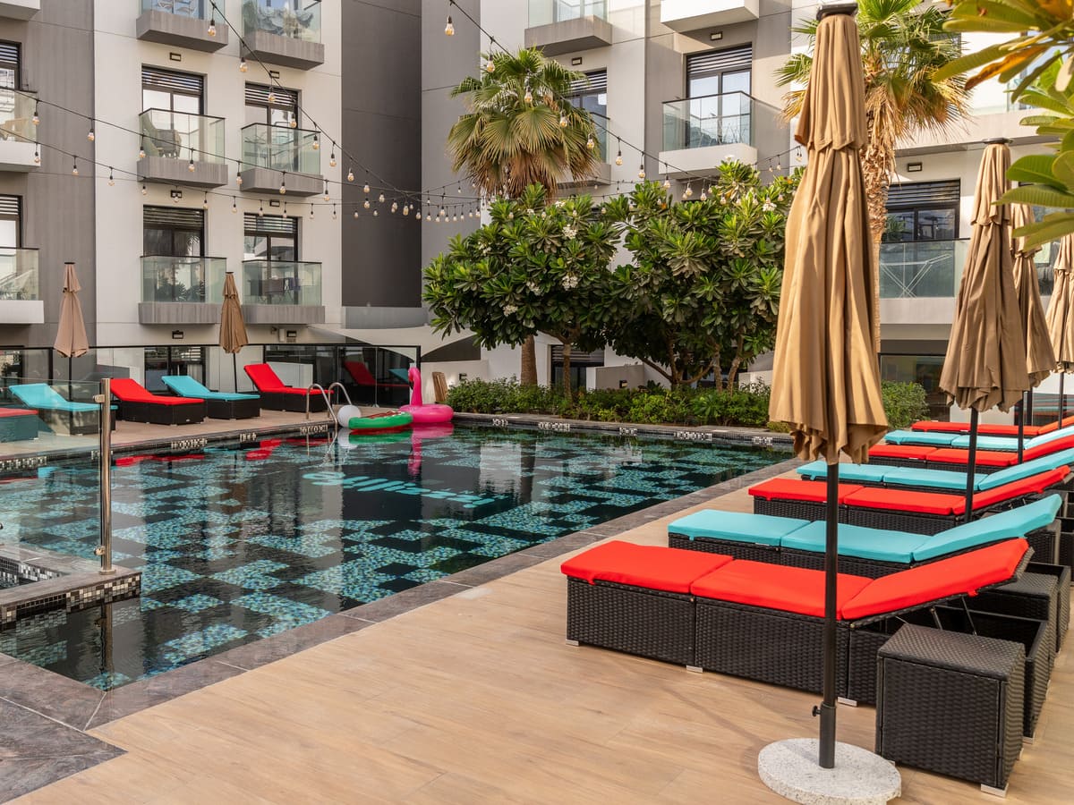 Outdoor cabanas by the pool amenity image