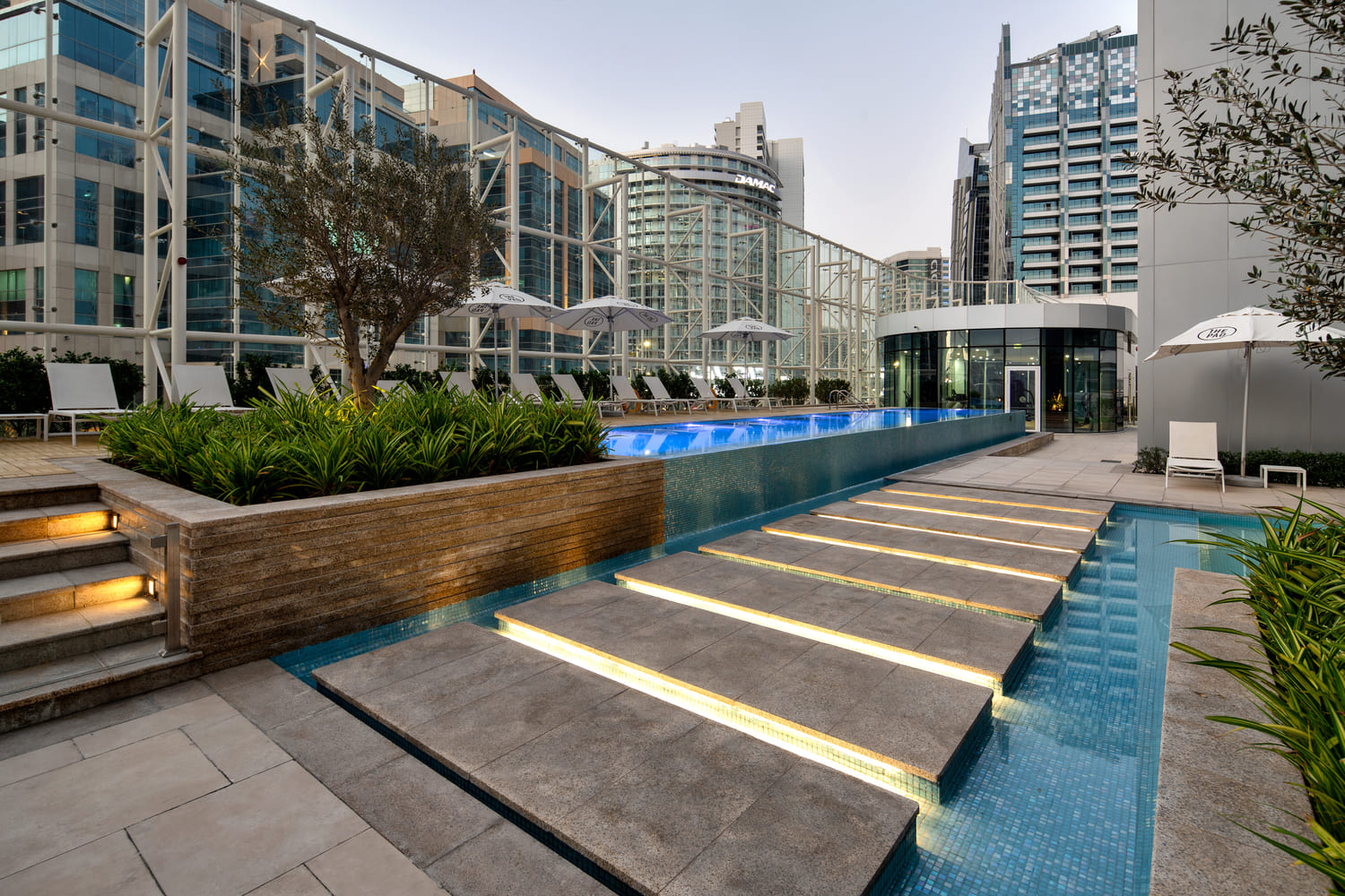 The Pad’s pool, with cabanas and tanning deck amenity image